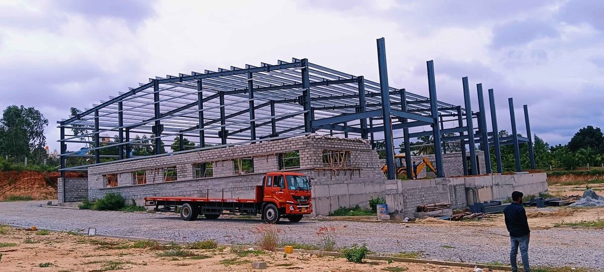 Industrial PEB Structure for Dev Components Pvt Ltd built by Hemagni Build Pro Hosur